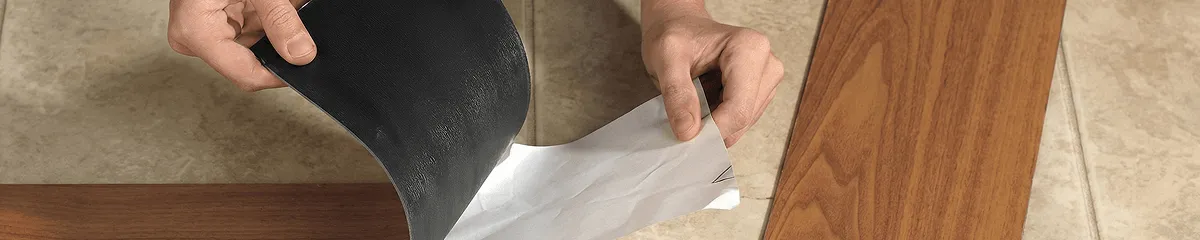 A professional installing vinyl flooring in Milwaukee, WI